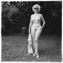 Nudist Lady with Swan Sunglasses - Diane Arbus