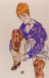 Portrait of the Artist's Wife Seated, Holding Her Right Leg - Egon Schiele