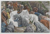La Sainte Vierge baise la face de Jésus avant qu'il ne soit enveloppé par les suaires sur la pierre de l'onction - James Tissot