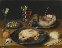 Still Life of a Roast Chicken, a Ham and Olives on Pewter Plates with a Bread Roll, an Orange, Wineglasses and a Rose on a Wooden Table - Osias Beert
